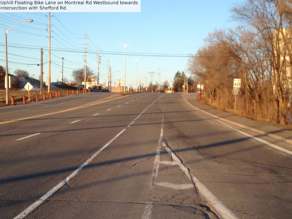 Uphill floating bike lane on Montreal Rd westbound toward intersection with Shefford Rd.
