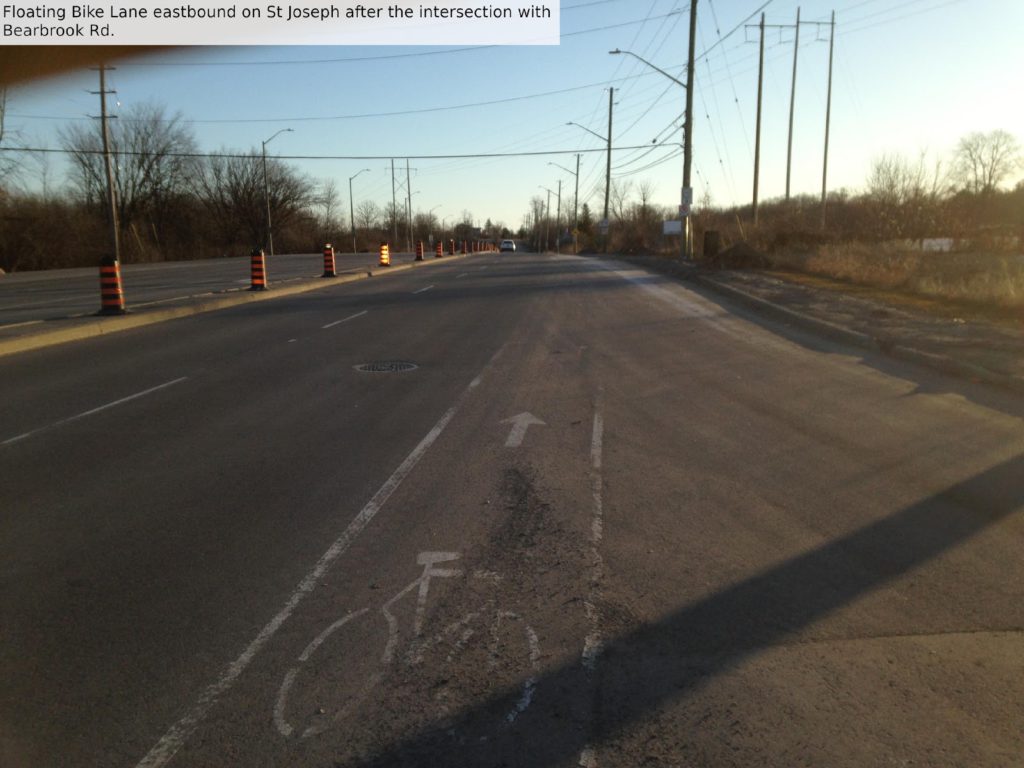 Floating bike lane eastbound on St Joseph after the intersection with Bearbrook Rd.
